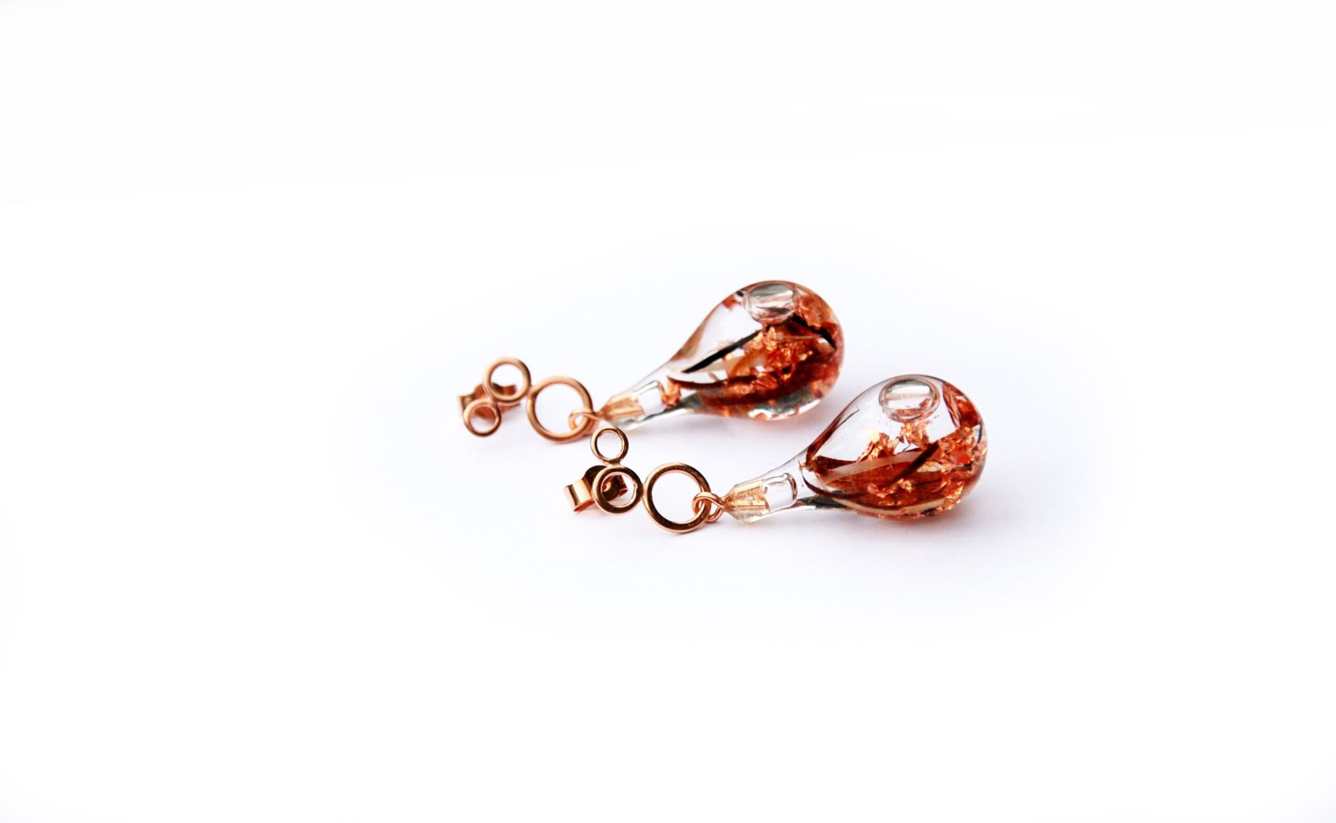 Glass drop earrings with copper leaf on rose gold studs