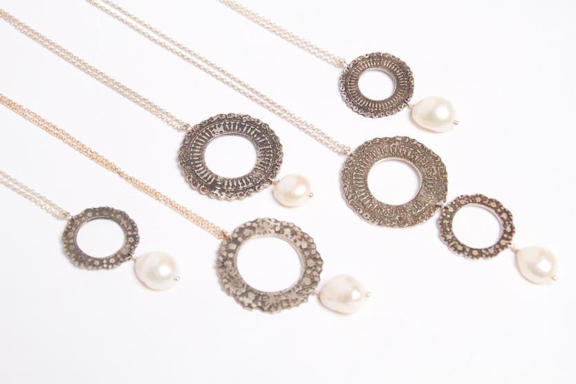 Textured silver circle pendants with pearl drops