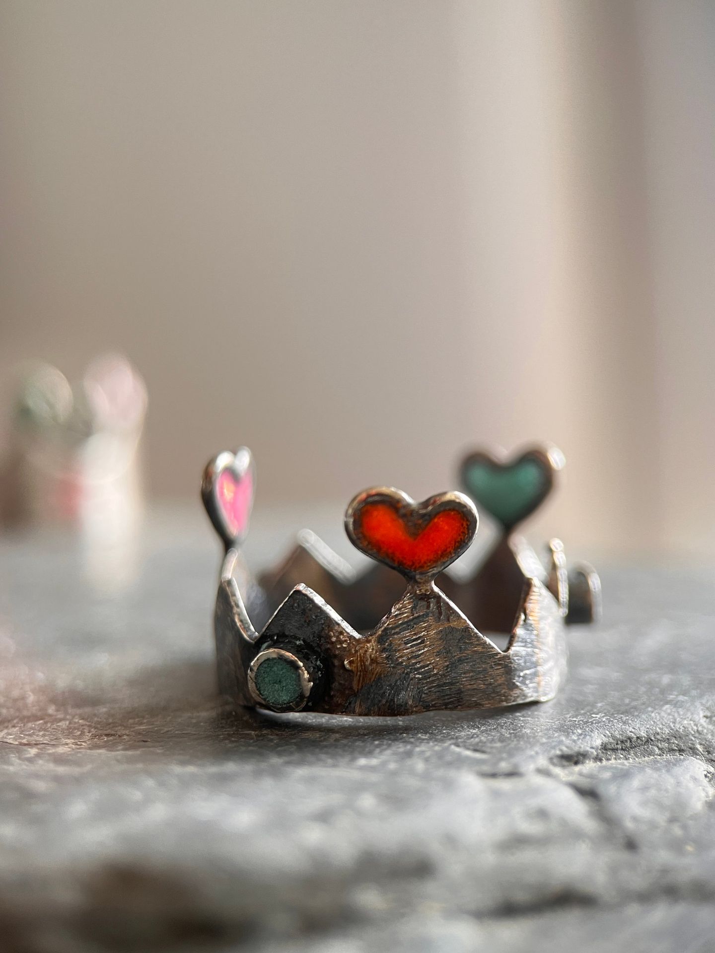 Silver crown ring with enamelled hearts